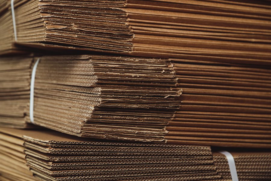 corrugated cardboard packing pile corrugated cardboard sheets warehouse